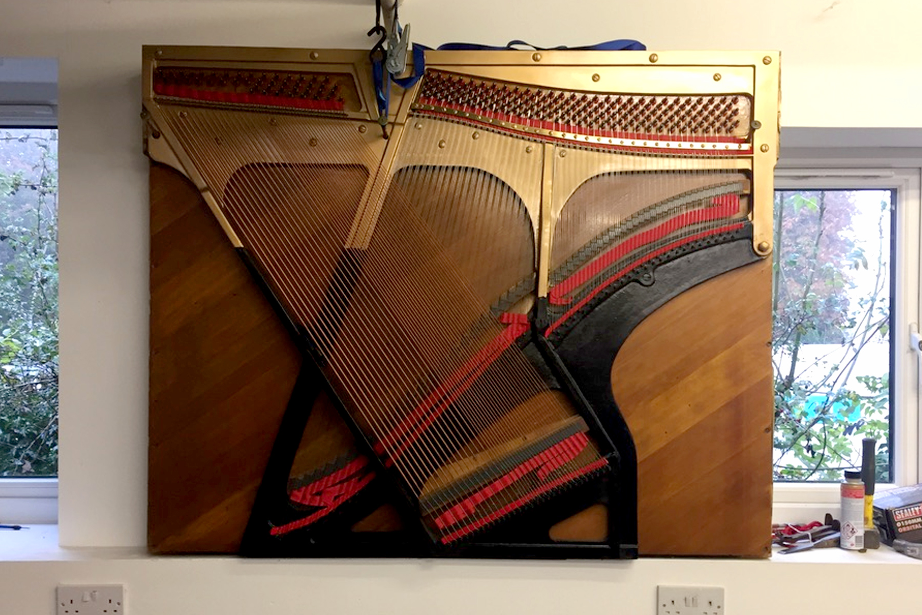 Hanging piano artwork